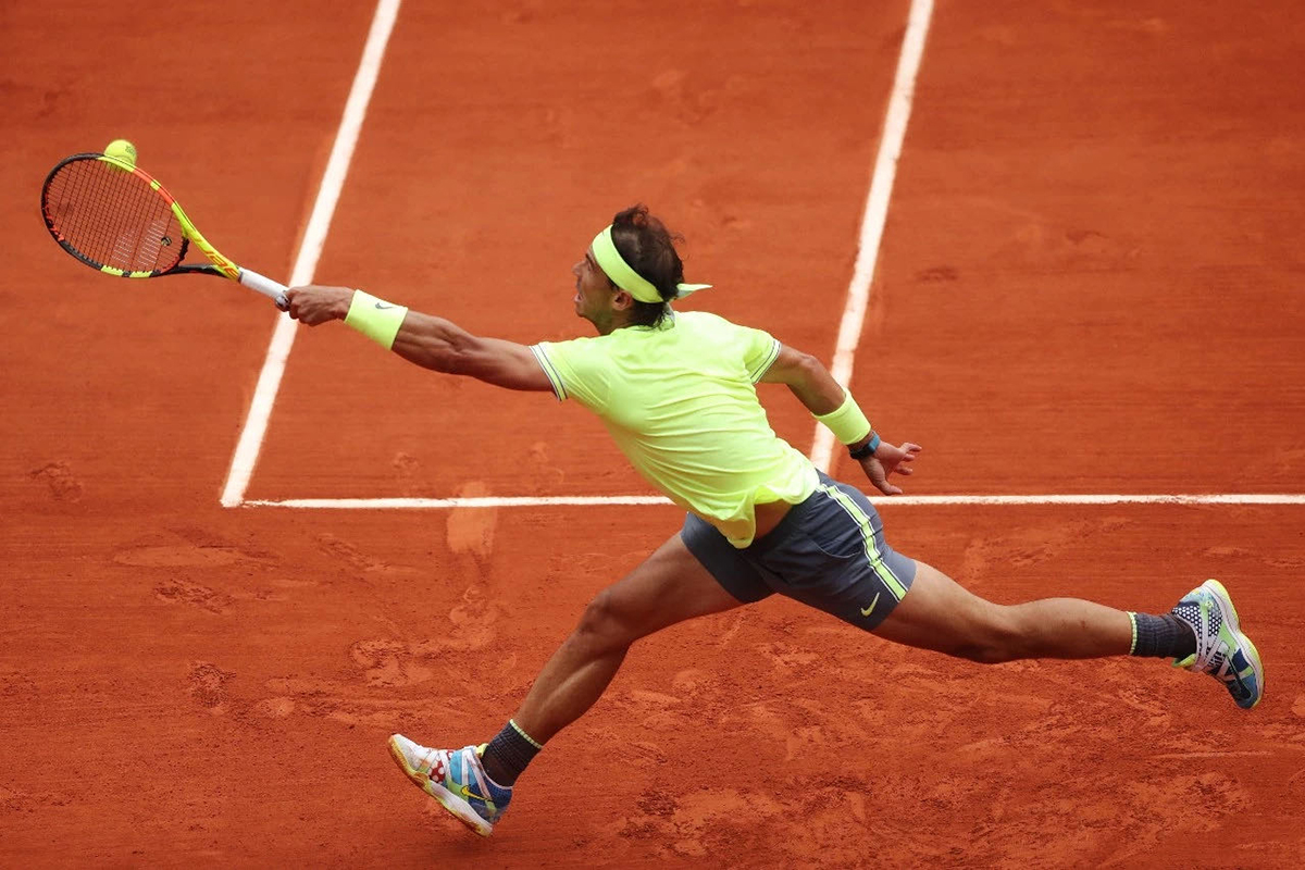 百年文化沉淀积累的红土网球场